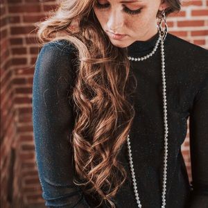 Long strand beaded necklace in light grey